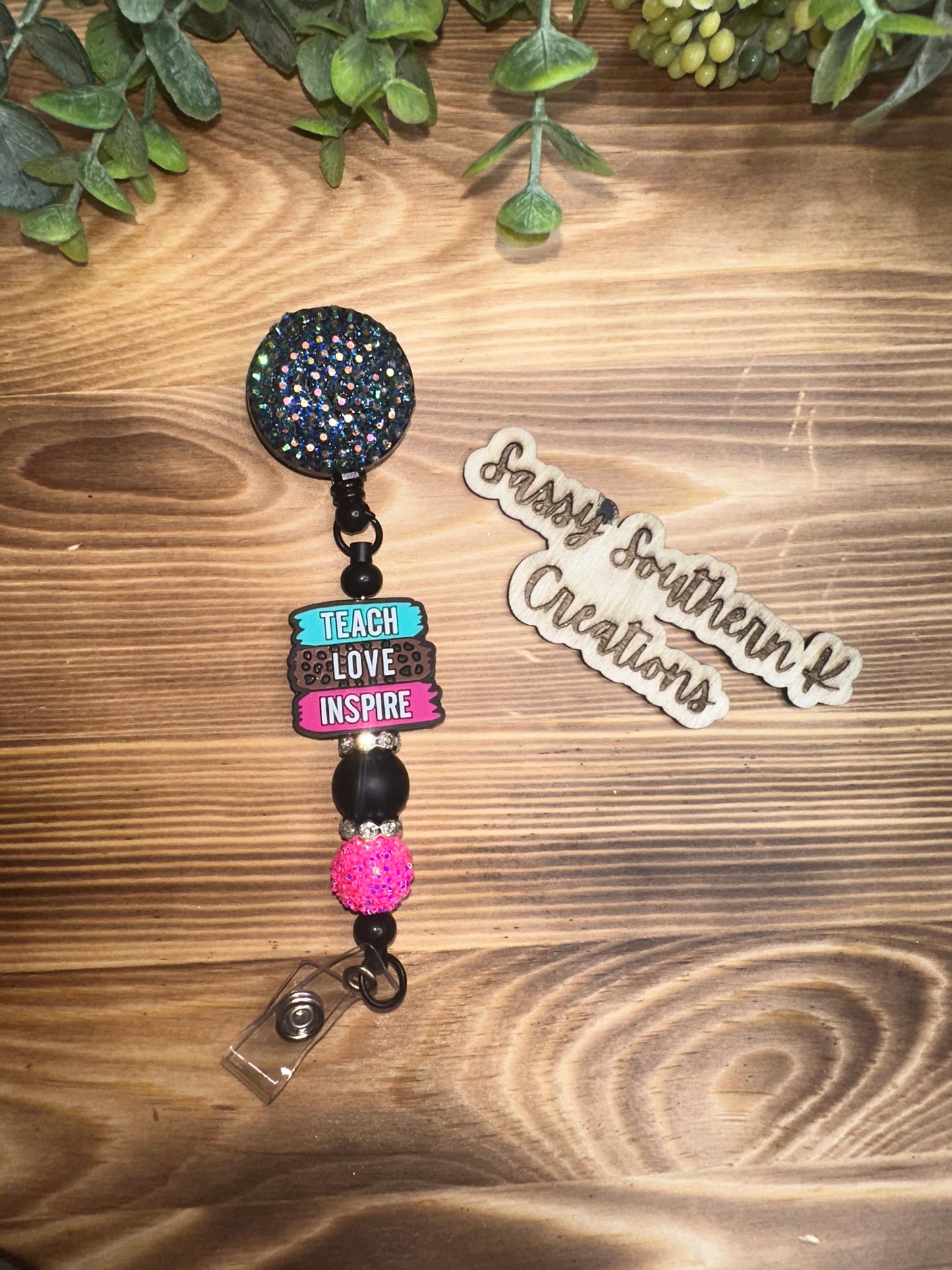 Teach Love Inspire badge reel